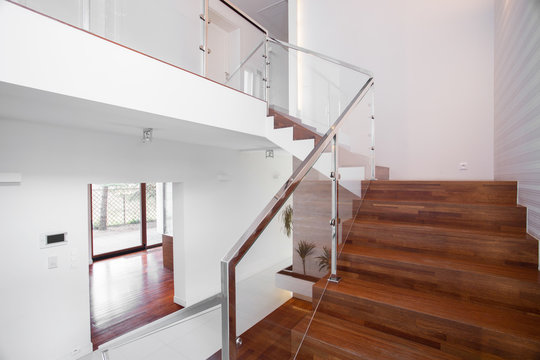 Wooden stairs with elegant balustrade