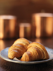 croissants on plate with copy space composition