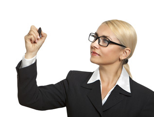 Business girl with glasses writes a marker