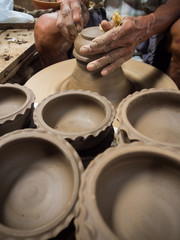 Fototapeta na wymiar Making clay pot