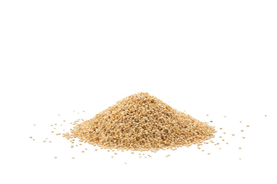 Pile of quinoa seeds isolated on a white background
