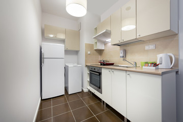 White, small and compact kitchen interior design
