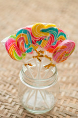colorful lollipops on white background
