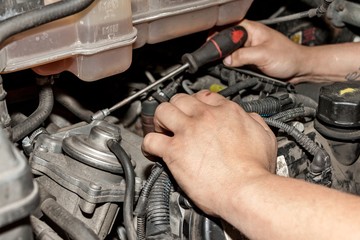 Mechanic working on engine