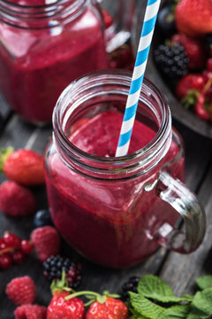 Summer berries smoothie in mason jar