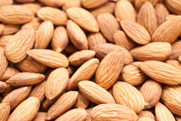 Peeled almonds closeup. For vegetarians.