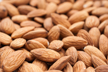 Peeled almonds closeup. For vegetarians.