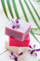 natural soap on bright wooden background