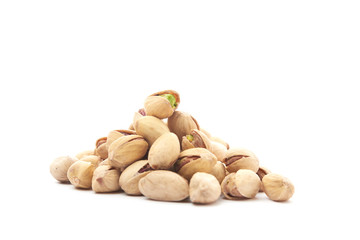 Heap of pistachios nuts isolated on the white