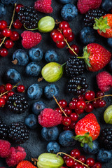 Obraz na płótnie Canvas Mixed fresh ripe berries background