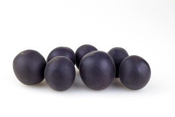 Group  black apricots isolated