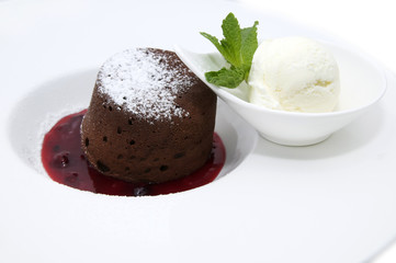  piece of cream cake decorated with chocolate and mint