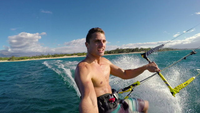 Young Man Kitesurfing in Ocean. Extreme Summer Sport HD. Point of View
