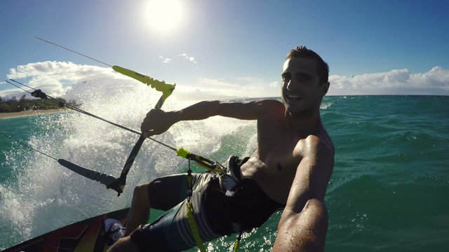 Young Man Kite Boarding in Ocean. Extreme Summer Sport POV
