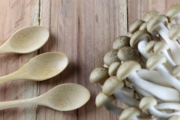 Shimeji mushroom and wooden spoon.
