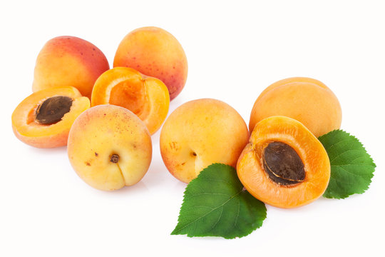 Apricots fruit scattered isolated on white