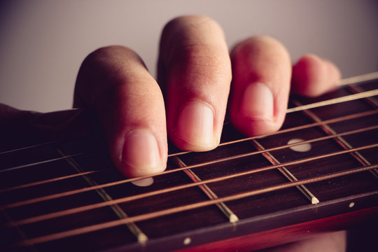 Playing on acoustic guita