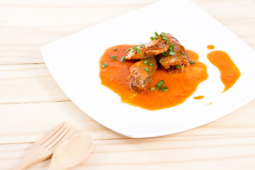 Canned fish in tomato sauce