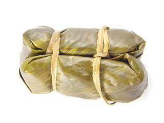 Thai Sticky Rice Wrapped in Banana Leaf on white background, Thai local dessert