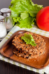 Vegetable fritter made of zucchini, red bell pepper, eggs