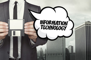 Information technology text on speech bubble with businessman