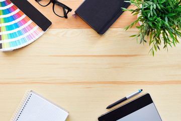 Top view of work desk graphic designer