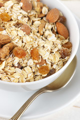 Oatmeal flakes with nuts in bowl