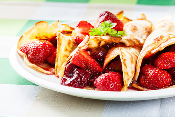 Traditional crepes served with strawberries