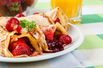 Traditional crepes served with strawberries