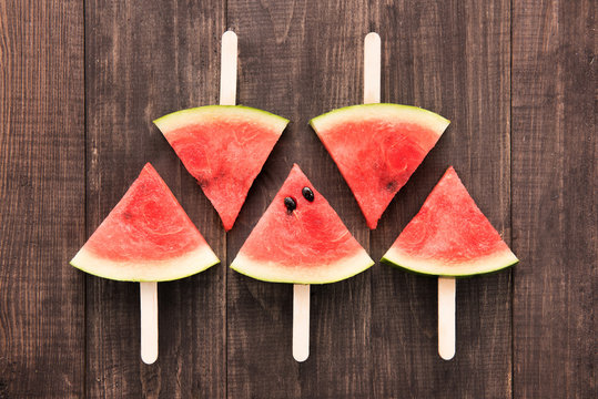 Fruit ice cream sliced watermelon on wooden background
