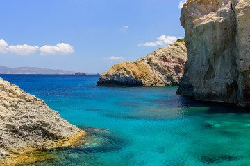 Picturesque cliffs and the sea, Firopotamos village, Milos island, Cyclades, Greece.
