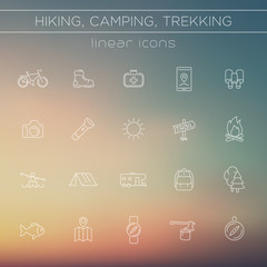 Hiking, Camping, Backpacking, Trekking line icons on blur background