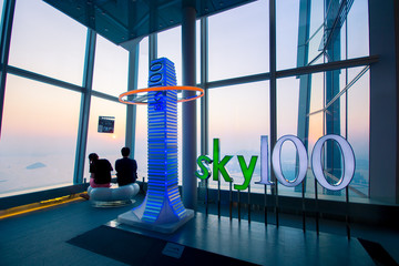 HONG KONG, CHINA
Logo of Sky100 observation deck on October 5th, 2013, Hong Kong, China. Sky100 is a observation deck on the 100th floor of the International Commerce Centre.
 - obrazy, fototapety, plakaty