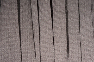 Closeup of gray fabric textile material as texture or background
