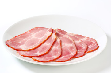 Slices of smoked pork neck