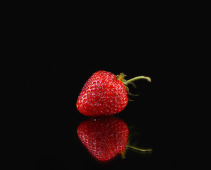 strawberries on a black background