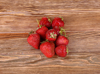 Ripe strawberries, isolated on wooden background. Top View