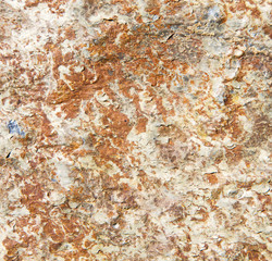 rocks stone and red orange gneiss in the wall of morocco
