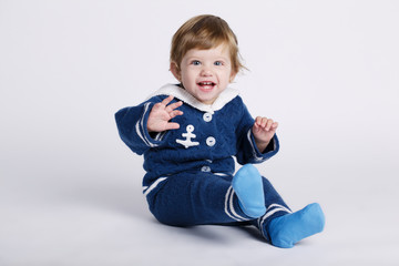 little sailor baby on white background