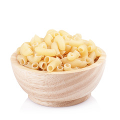 Pasta in wooden bowl, isolated on white background