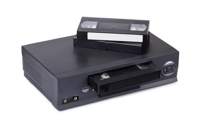 Old VHS video recorder and cassettes