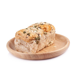 whole wheat bread in the wooden plates isolated on white backgro