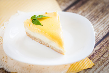 Lemon cheesecake on a white plate