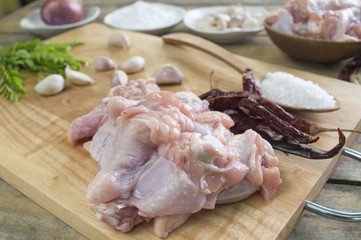 Chicken Wing Stick on the wood chopping block on wood table with ingredient