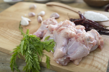 Chicken Wing Stick on the wood chopping block on wood table with ingredient