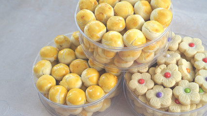 tins of sweet and colorful cakes food