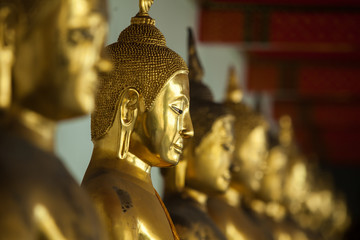 Golden buddha statue in temple.