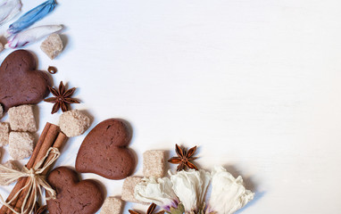 Chocolate cookies, brown sugar, anisetree and cinnamon on white