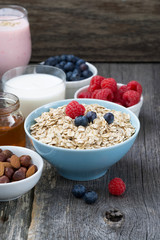 fresh breakfast products on a wooden background, close-up