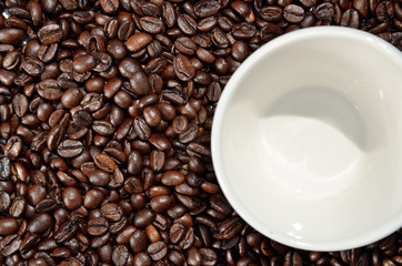 Beans and cup of coffee